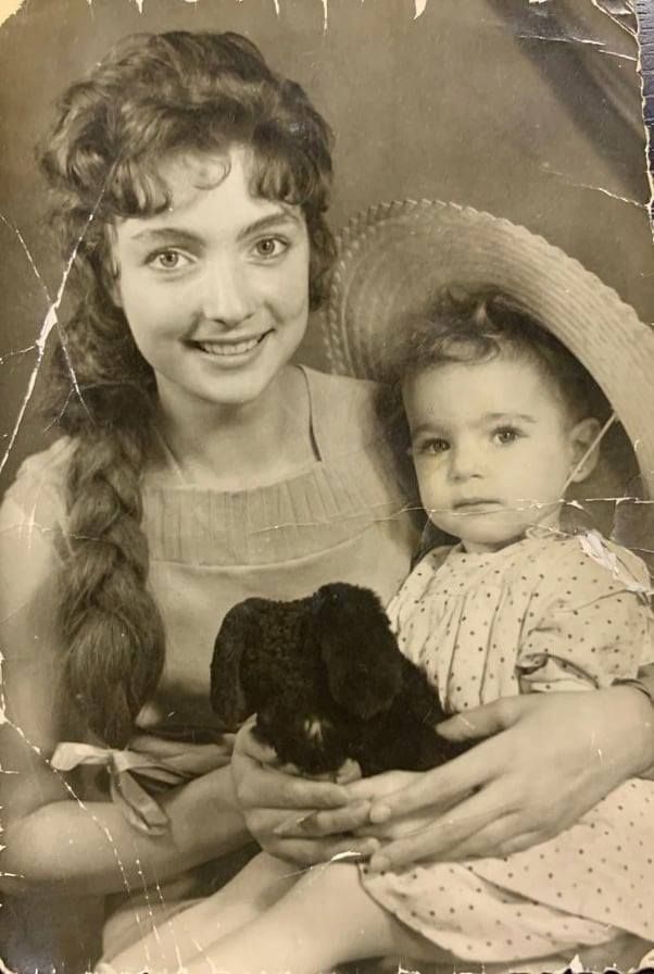 Old damaged black and white family photo before restoration